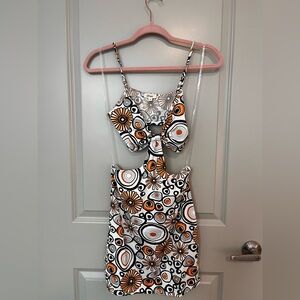 Retro Patterned Dress with Orange and Black Accents